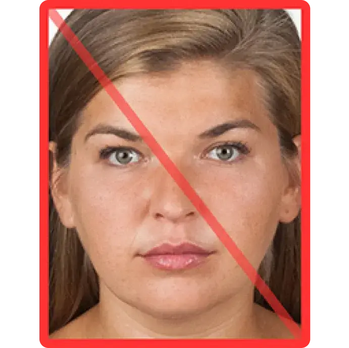 Nieprawidłowe wykadrowanie twarzy na zdjęciu do paszportu