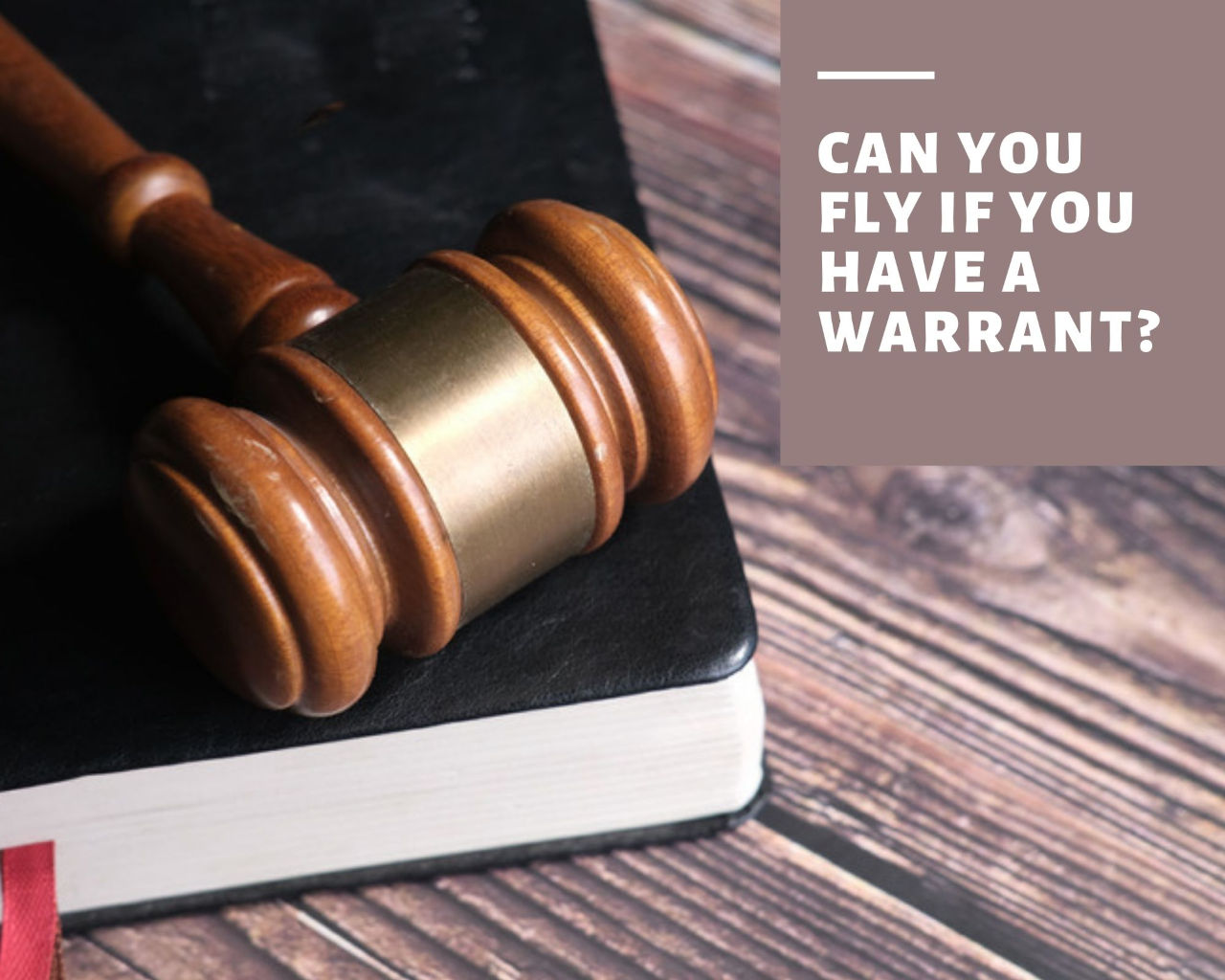 Can you fly if you have a warrant?