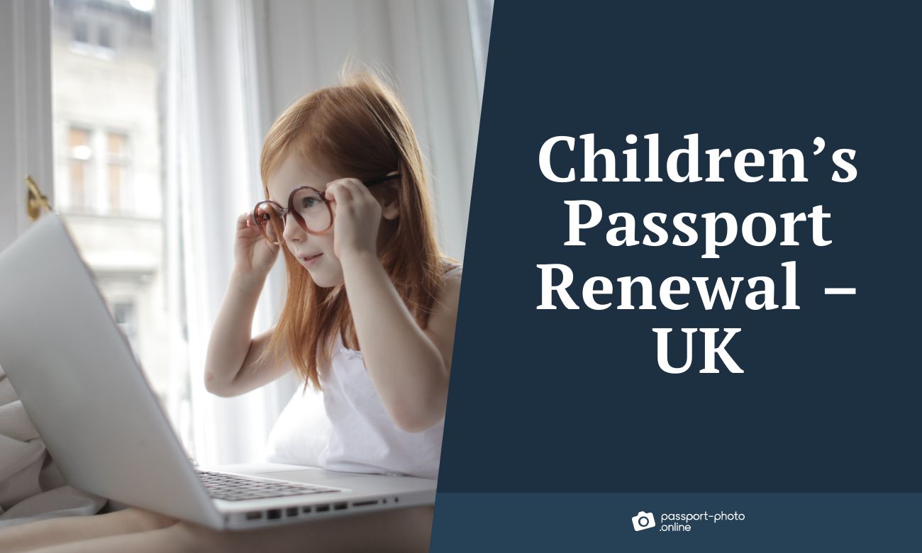 A red-haired girl around 7 years old in front of the laptop with big adult glasses. Is she familiar with the children's passport renewal in the UK?