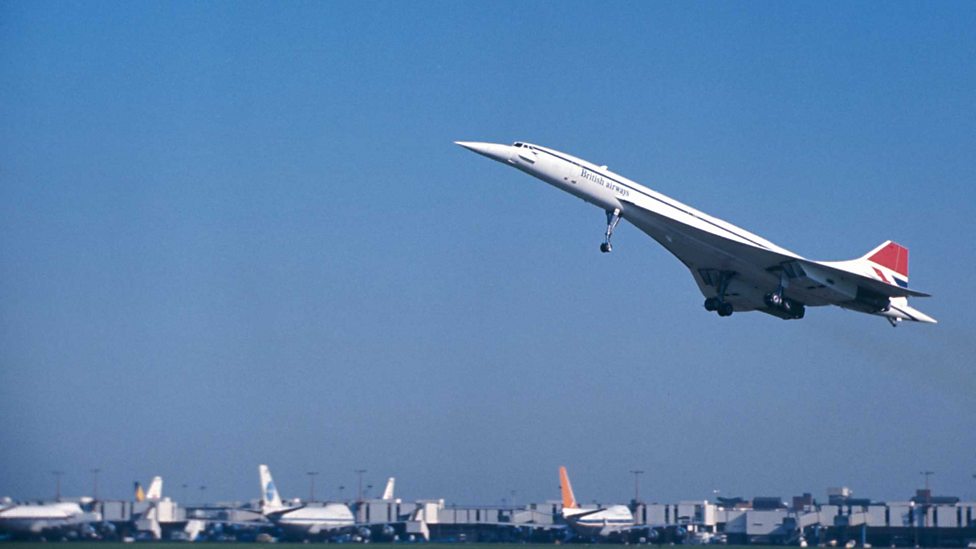 Picture of Concorde taking off in 1971, with other planes in the background.