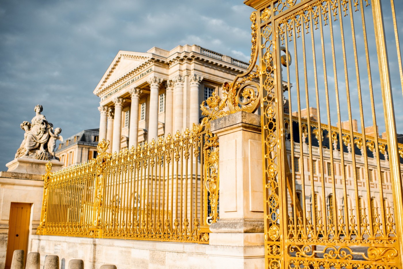 The golden gate of the palace of Versailles in France