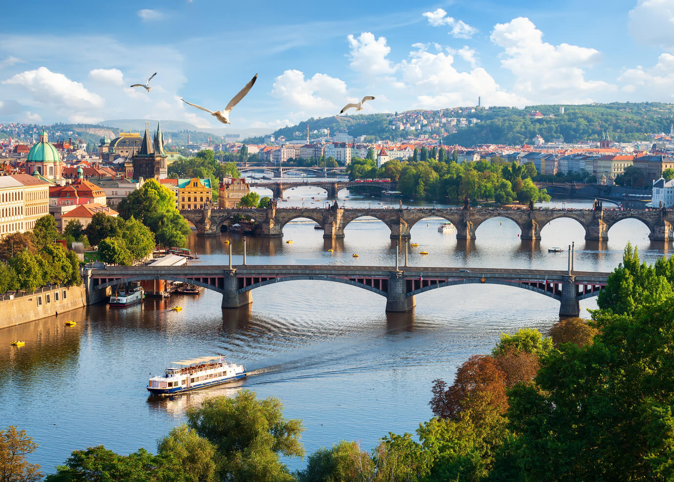 Row of bridges in Prague at summer day