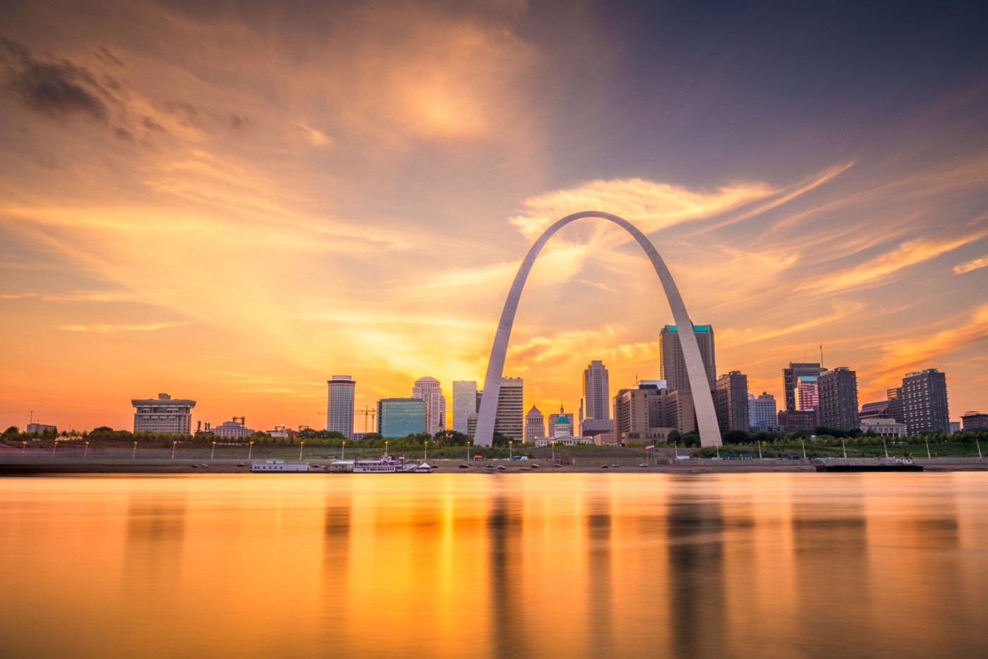 St. Louis, Missouri, USA downtown cityscape on the Mississippi River at twilight.