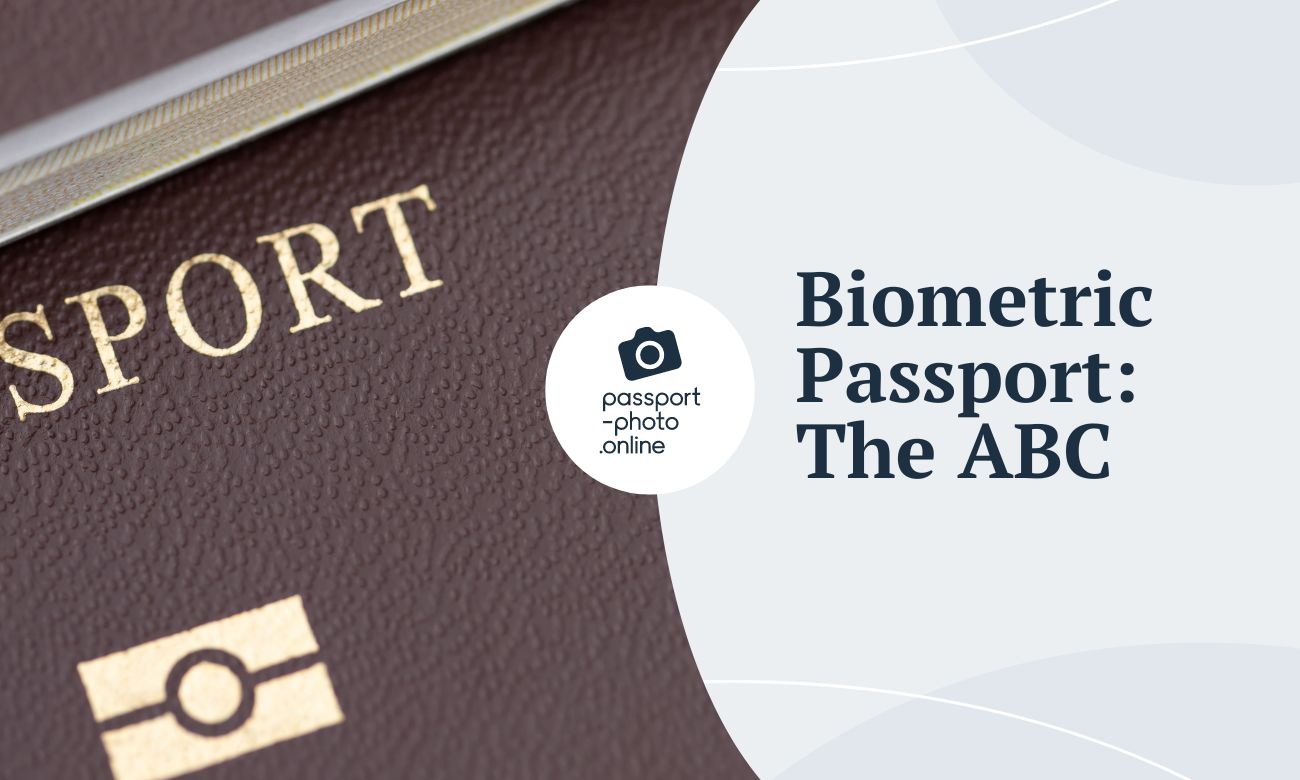The cover of a U.S. passport shows the biometric passport symbol, a small, golden color, camera logo.