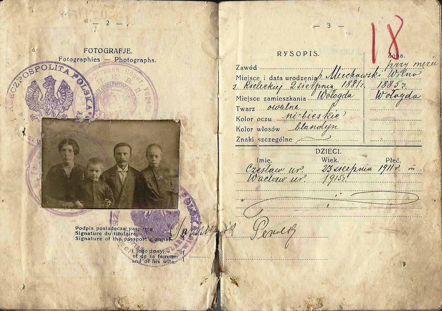 Polish passport showing the head of the family with his wife and two children